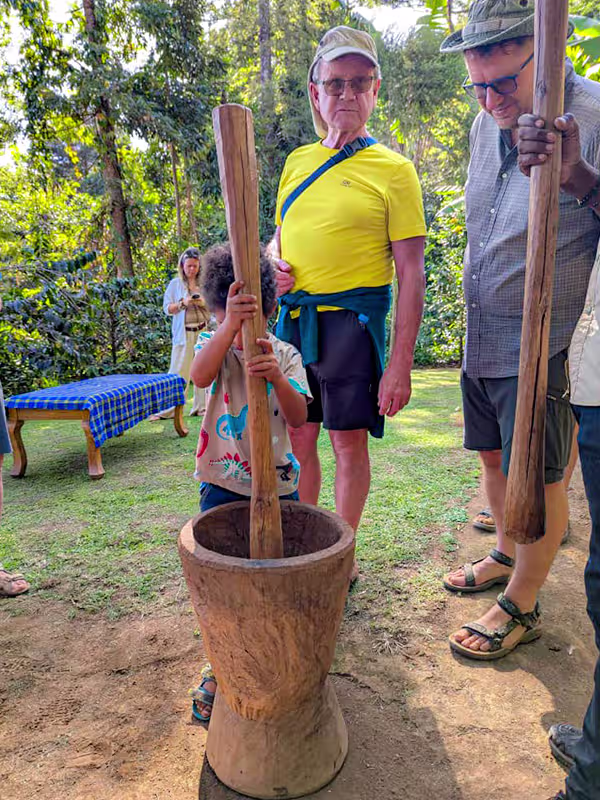 Nuru Activities guide welcoming guests in Bangata village